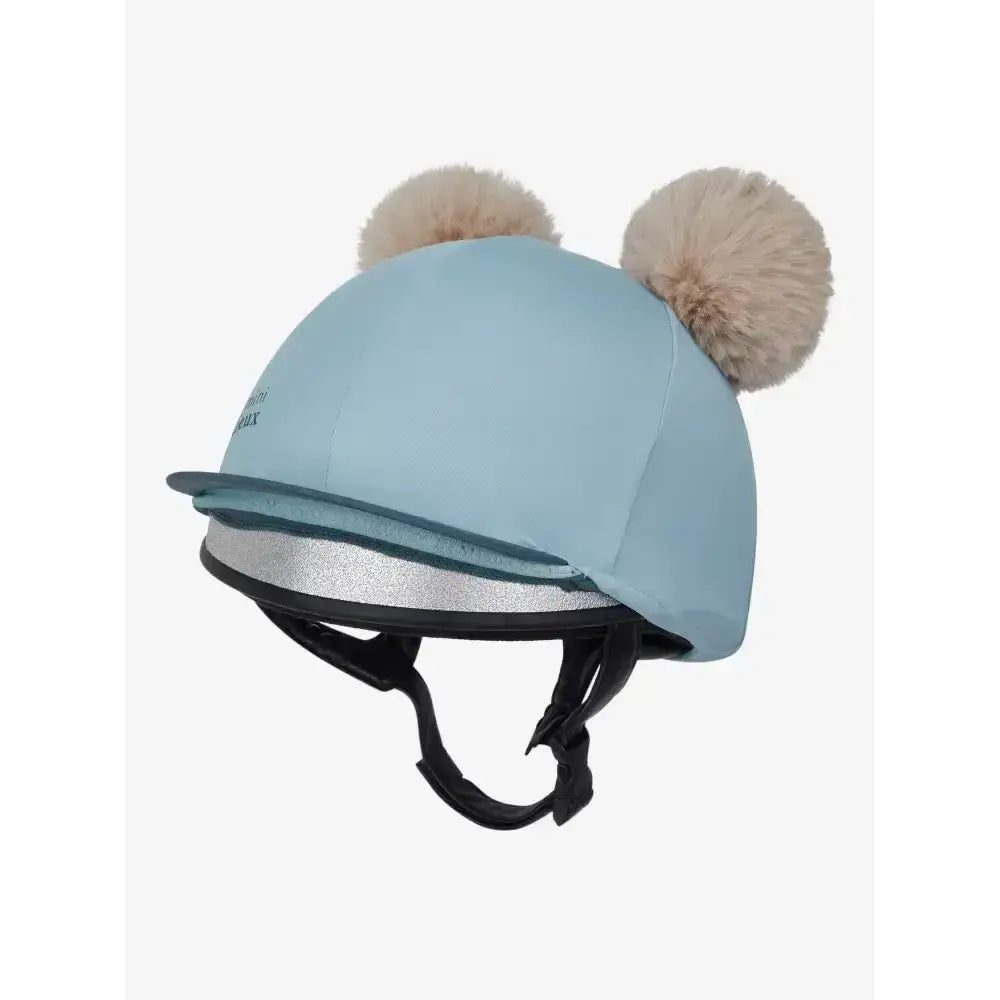 Light blue lemieux mini double pom hat silk glacier equestrian helmet cover with fluffy beige pom-poms on top