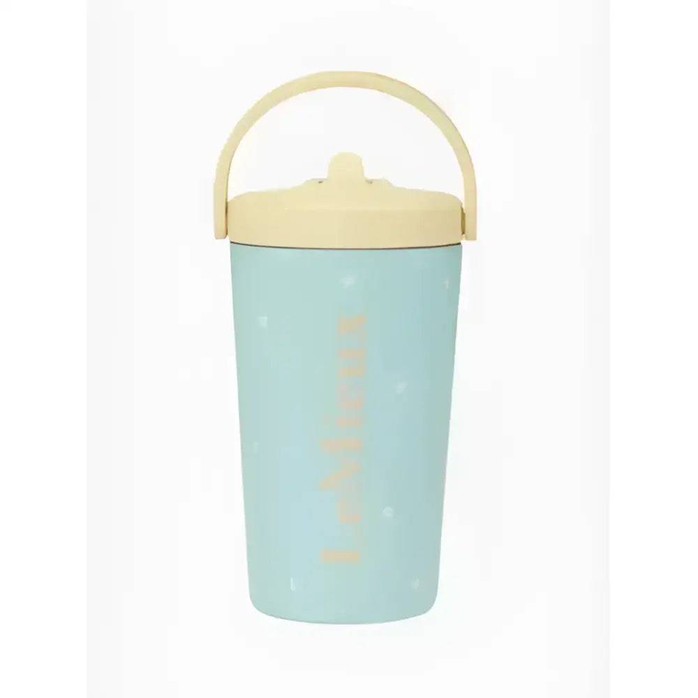 A pastel blue lemieux mini drinks insulated sippy cup with beige handle and gold foil lettering lemans