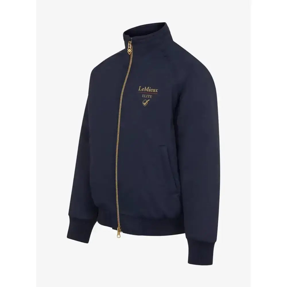 Navy blue lemieux mini elite team jacket with gold zipper and fully taped seams for outdoor riding comfort