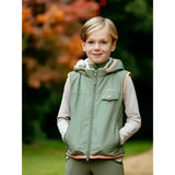 A child wearing a lemieux mini george rosemary gilet in green with pink trim and matching pants