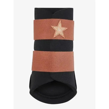 Black and rust striped mini grafter boots apricot by lemieux with gold star emblem on hoof protector