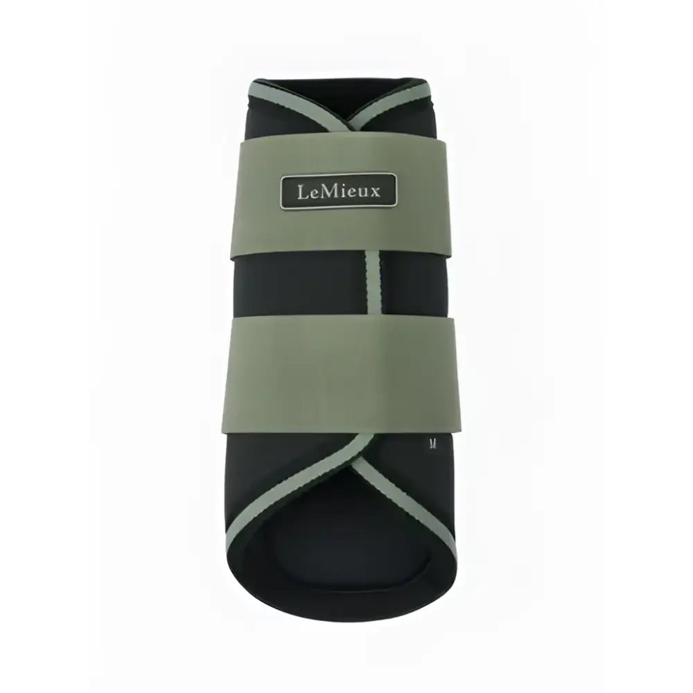Black and olive green lemieux mini grafter brushing boots rosemary with white stitching for horse leg protection