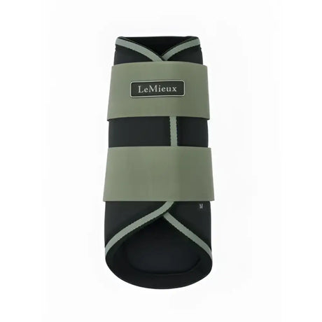 Black and olive green lemieux mini grafter brushing boots rosemary with white stitching for horse leg protection