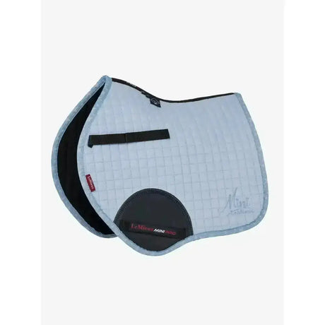 Light blue quilted lemieux mini jump suede saddle pad with black trim and central strap jump suede square design