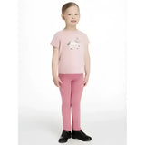 A soft pink short-sleeved t-shirt with a white and gray unicorn graphic perfect for pairing with lemieux mini legging sets