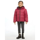 A child wearing a magenta lemieux mini megan reversible puffer ember with quilted design and plaid hood lining