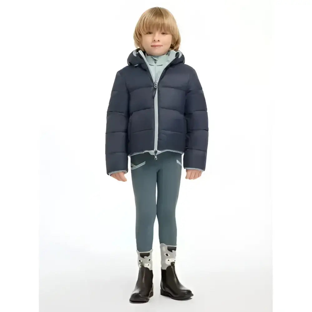Dark blue lemieux mini megan reversible puffer navy jacket with quilted design and light gray zipper trim lining