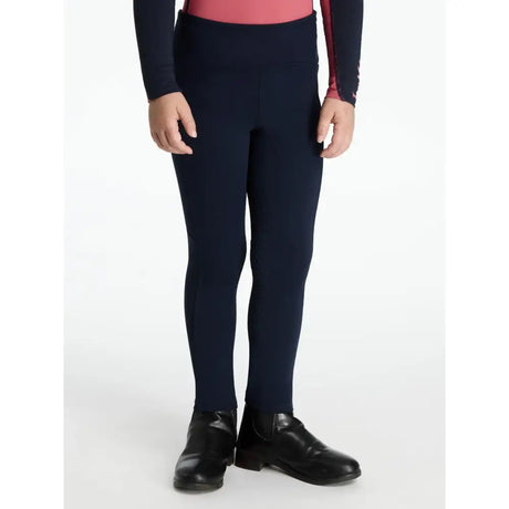 Navy blue lemieux mini nora high-waisted leggings with smooth stretchy fabric and subtle side seam detailing