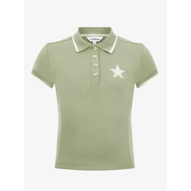 A sage green lemieux mini polo shirt fern in soft pique jersey with cream collar star buttons and large white chest star