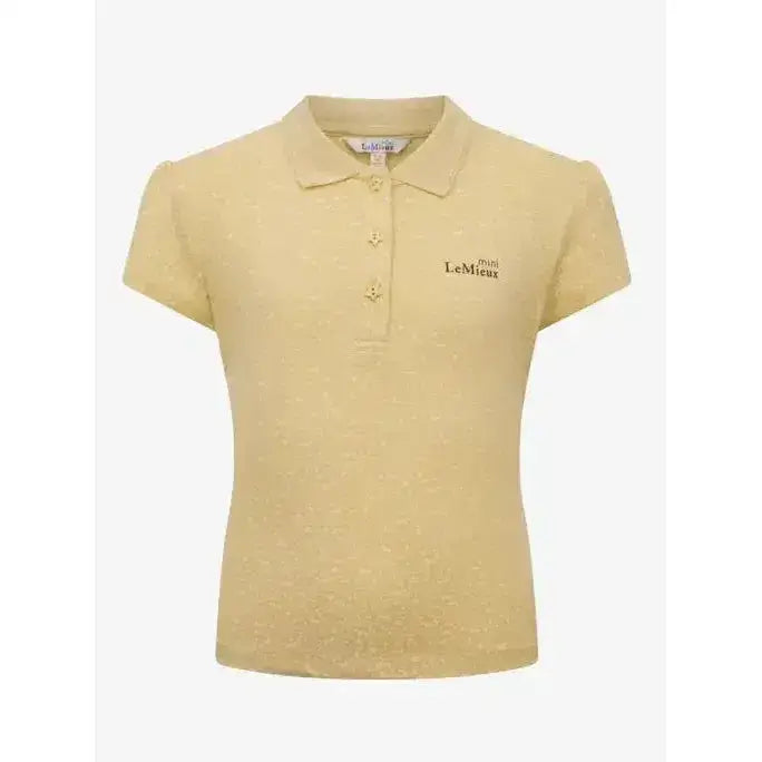 A pale yellow lemieux mini polo shirt mimosa with short sleeves subtle textured fabric and star buttons on the chest