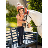 Young girl in riding gear next to horse wearing Lemieux Mini Polo Shirt Sherbet