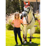 White horse in orange ear covers and red goggles wearing Lemieux Mini Polo Shirt Sherbet