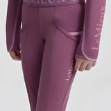 Purple lemieux mini pull breech mallow leggings with matching long sleeve top featuring 4-way stretch fabric and subtle branding