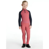 A child wearing coral and black lemieux mini pull ons cranberry long sleeve riding suit with subtle leg patterns