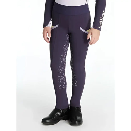 Navy blue lemieux mini pull ons juniper leggings with subtle white horseshoe pattern and light gray side panels