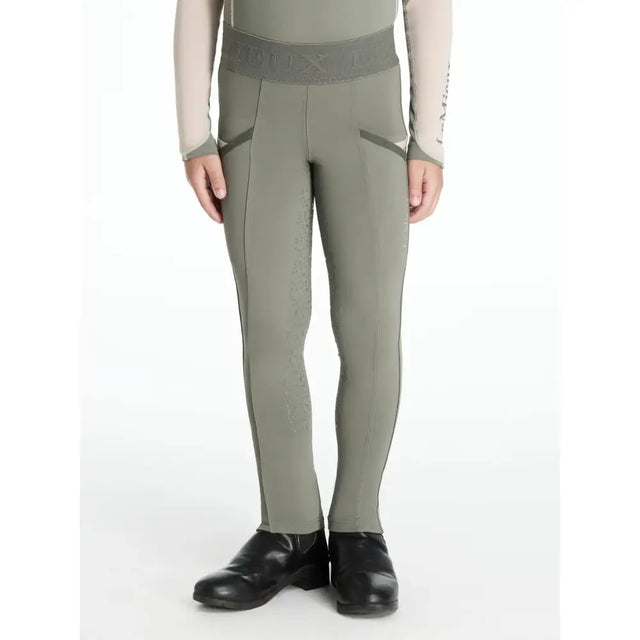 Olive green lemieux mini pull performance riding pants with gray waistband and subtle side seam detailing
