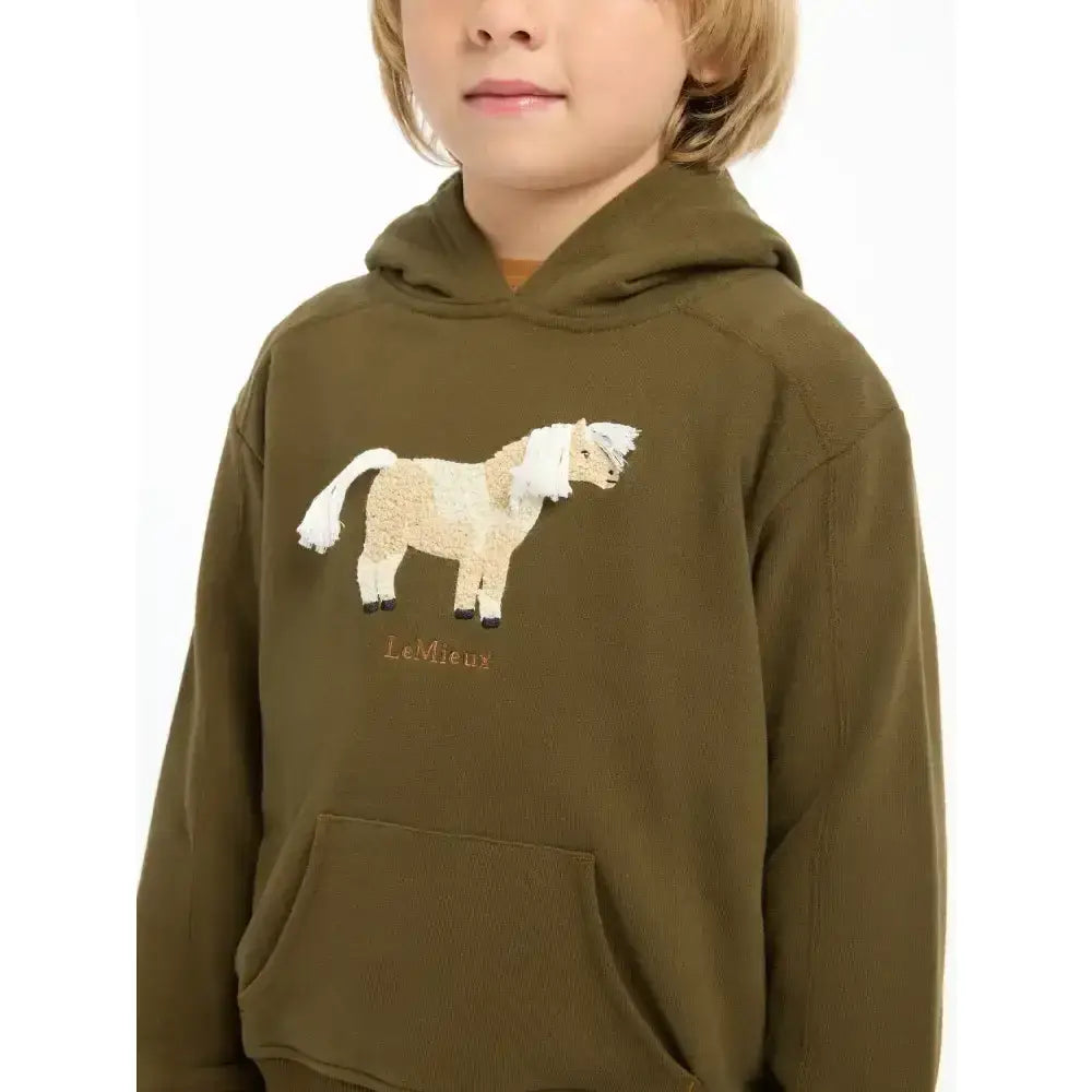Olive green lemieux mini romi hoodie with beige embroidered pony and lemieux branding in romi hoodie alpine style