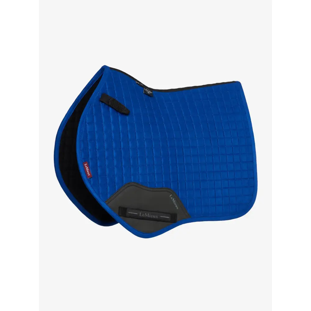 Bright blue lemieux mini suede close contact square benetton saddle pad with black and gray accents and lemieux label