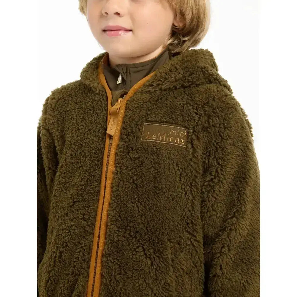 Olive green lemieux mini teagan plush hooded jacket with mustard yellow zipper and brand patch in teagan fleece alpine style