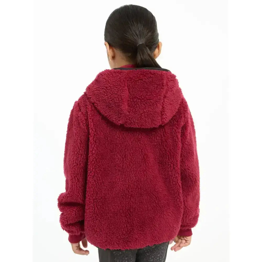 A cozy maroon lemieux mini teagan fleece ember hoodie with plush textured exterior and matching hood