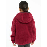 Red fuzzy hooded jacket worn by a child, showcasing Lemieux Mini Teagan Fleece Ember