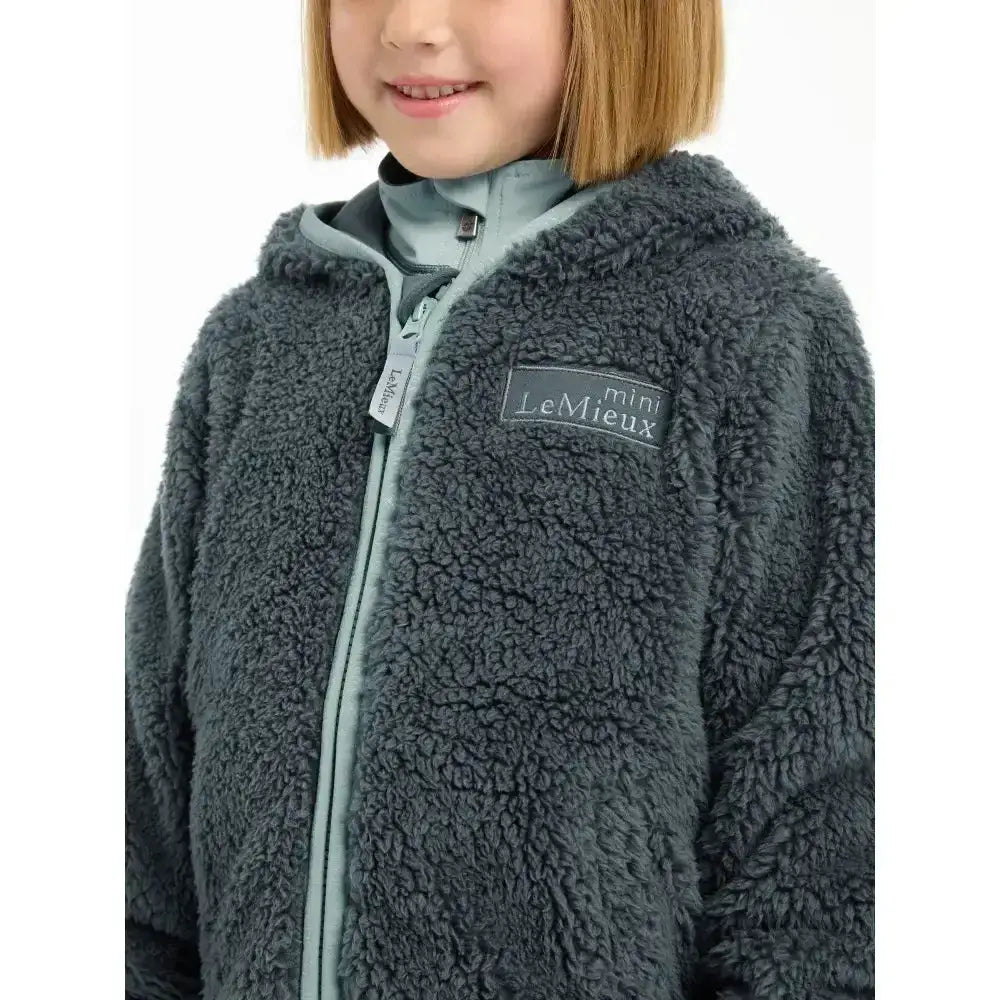 Dark gray lemieux mini teagan fleece petrol zip-up hoodie with plush fleece lining and light blue zipper and collar