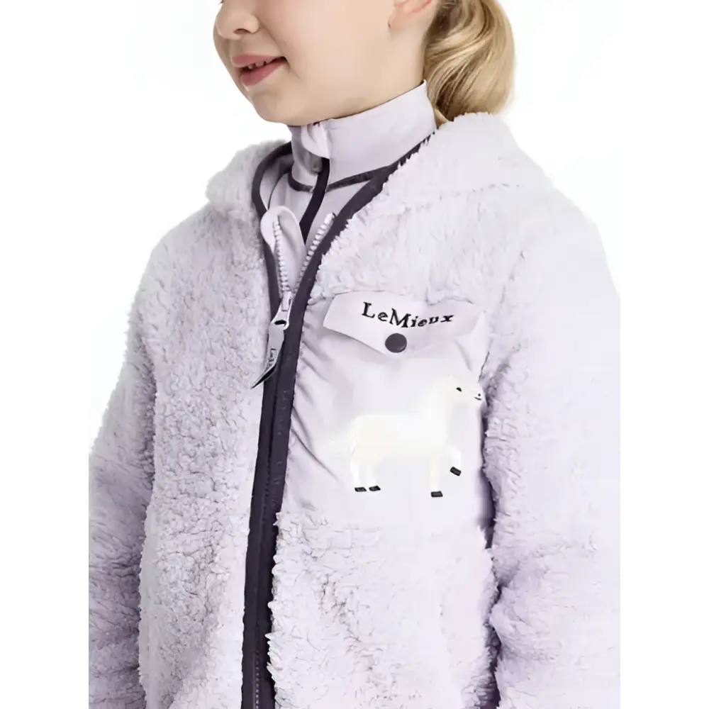 Light purple lemieux mini teagan lemon fleece lilac jacket with black zipper and white patch pocket