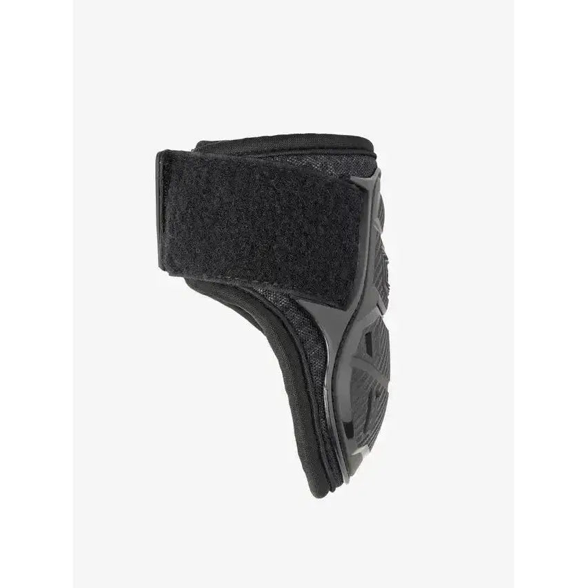 Black lemieux motion cool fetlock boot with textured padding and adjustable velcro strap for flexible lightweight support