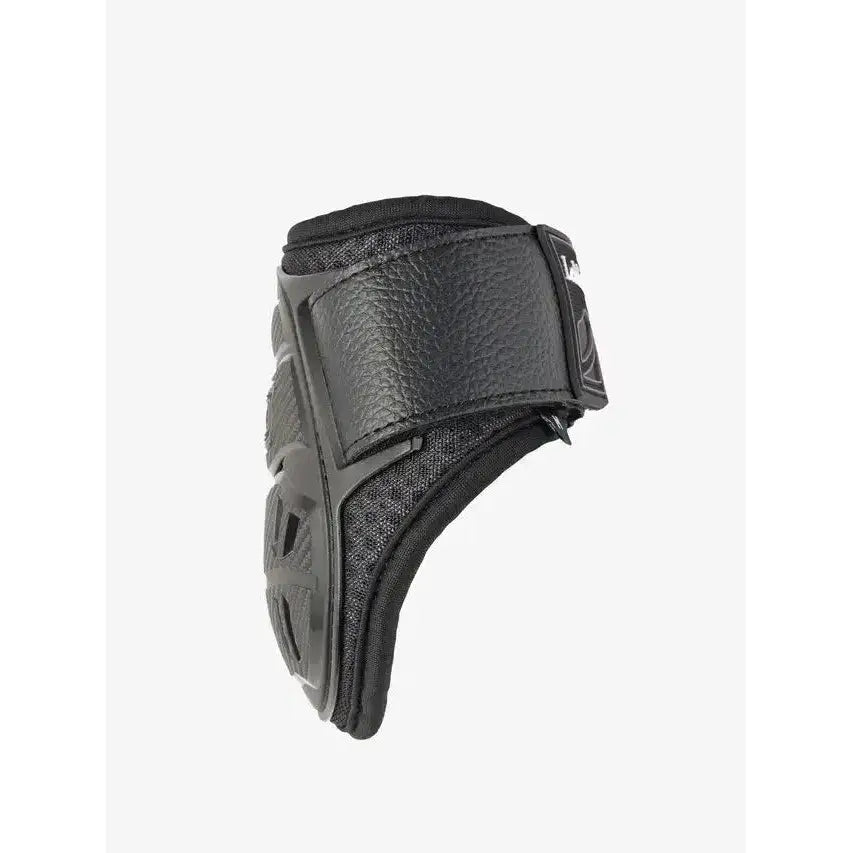 Black leather and mesh lemieux motion cool fetlock boot with flexible lightweight textured elbow pad design