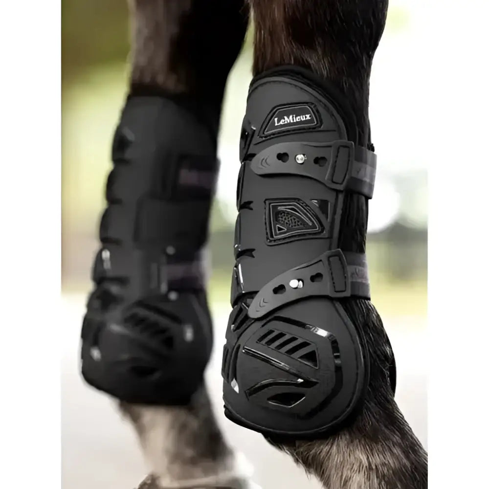 Black lemieux motion cool tendon boot with textured panels and adjustable straps for flexible lightweight protection