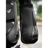Black glossy lemieux motionflex dressage boot with flexible contoured design and subtle texture for dressage use
