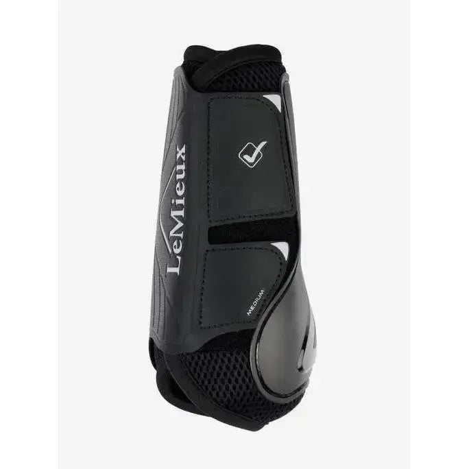 Black lemieux motionflex dressage boot with glossy plastic shell and breathable mesh panels for flexible motionflex dressage