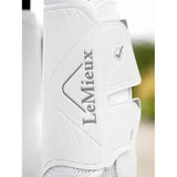 White lemieux motionflex dressage boot guard with sleek molded design and subtle gray logo detailing for flexible motionflex dressage