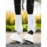 White lemieux motionflex dressage boot with sleek padded design and adjustable velcro straps for flexible motionflex use
