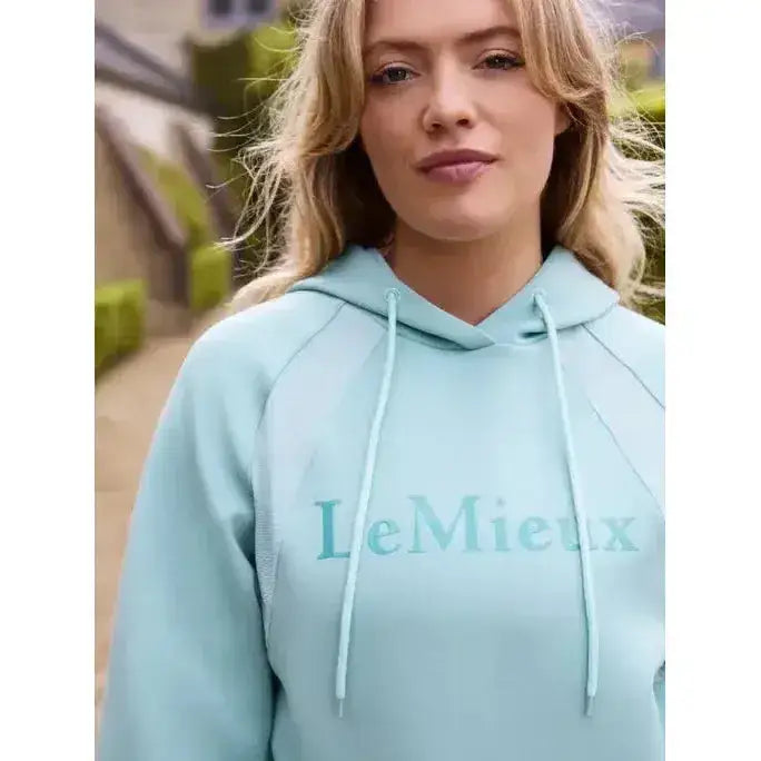 A soft mint green lemieux nadine hoodie aqua with matching drawstrings and subtle lemieux logo across the chest