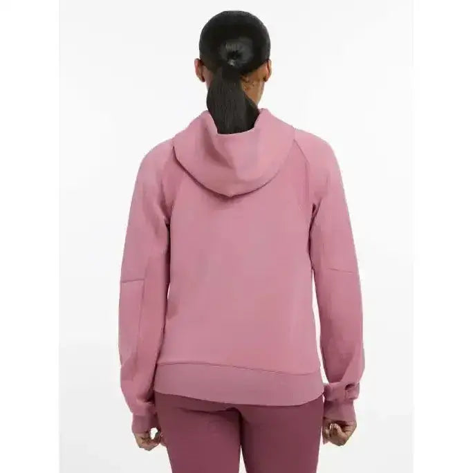A soft pink lemieux nadine hoodie with long sleeves ribbed cuffs and a relaxed fit called nadine hoodie peony