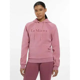 A soft pink lemieux nadine hoodie with matching drawstring hood and front pocket called nadine hoodie peony
