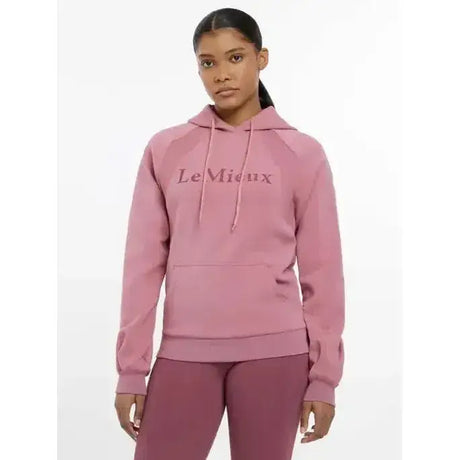 A soft pink lemieux nadine hoodie with matching drawstring hood and front pocket called nadine hoodie peony