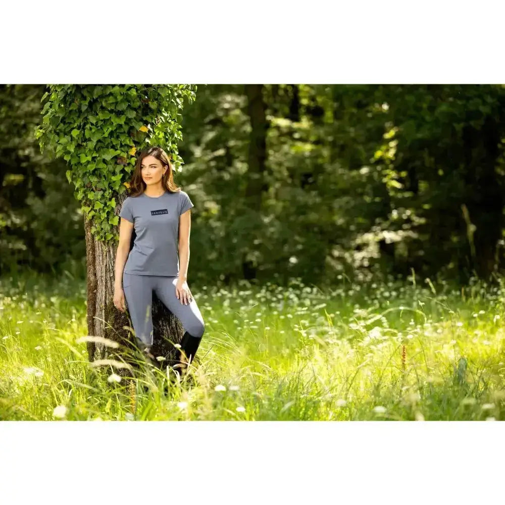 Gray short-sleeved t-shirt with small logo paired with lemieux naomi pull on breech jay blue featuring supportive elasticated waistband