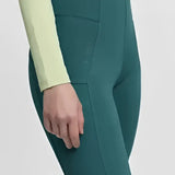 Teal high-waisted lemieux naomi pull leggings with sleek fit and subtle side seam detailing for active wear