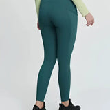 Teal high-waisted sleek leggings with form-fitting design perfect for riding in lemieux naomi pull breech jungle