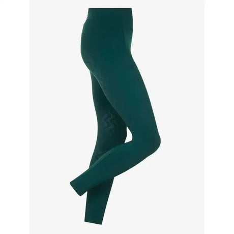 Dark green lemieux naomi pull on breech spruce riding breeches with smooth stretchy fabric and subtle thigh texture