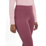 A pair of mauve high waisted form fitting lemieux naomi pull leggings with subtle side seam detail
