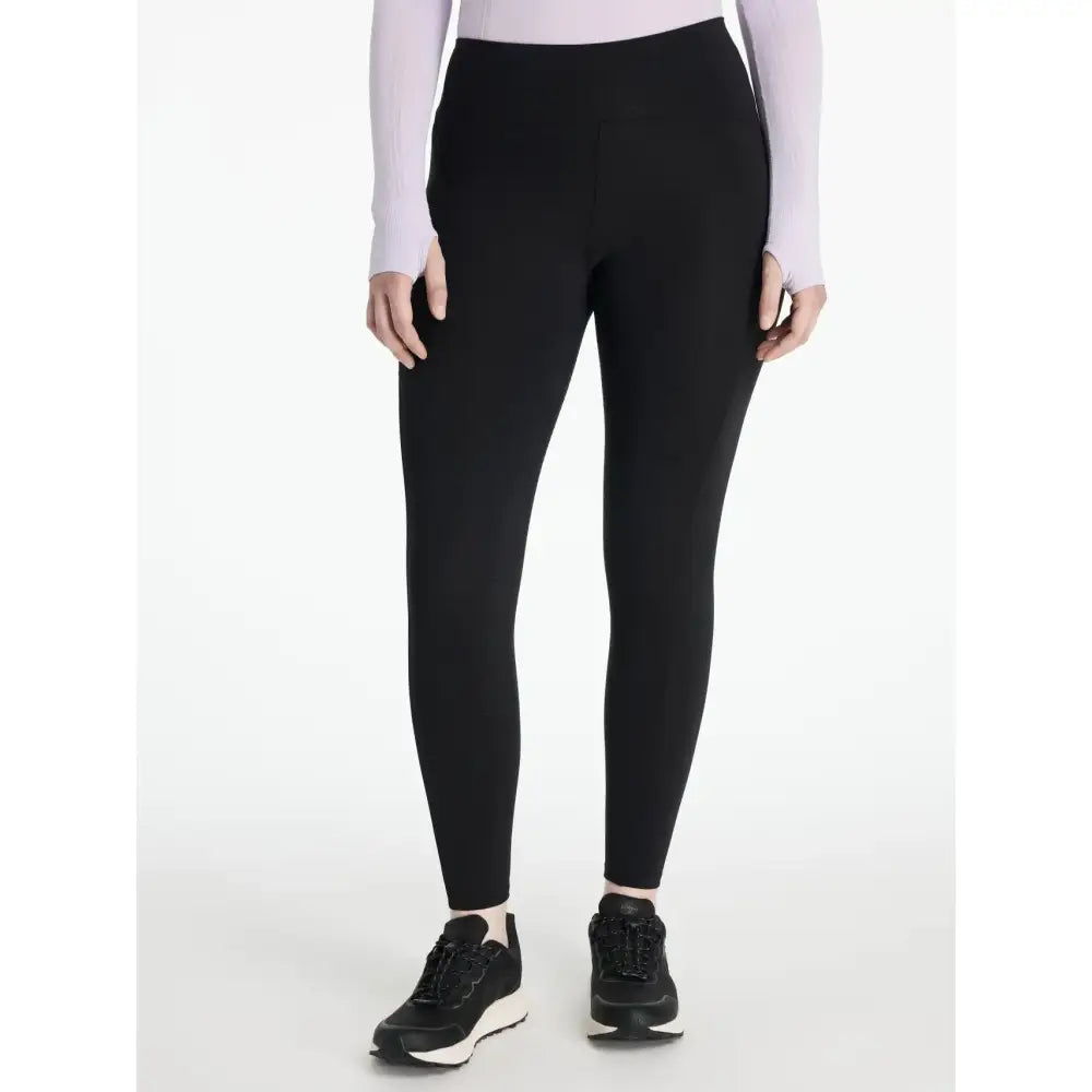 Black high-waisted leggings in lemieux natalie’s brush fabric with smooth stretch and subtle side seam detailing