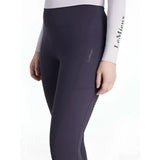 Dark purple lemieux natalie brushed riding leggings with subtle seam detail and branded thigh logo