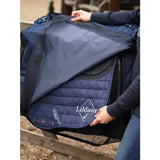 Navy blue quilted lemieux saddle pad with white embroidered logo perfect for true lemieux aficionados saddle pad collection