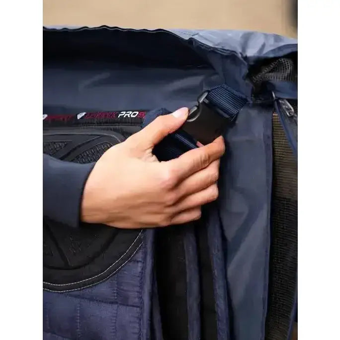 Dark blue nylon strap with black buckle and red technical pros logo on lemieux saddle pad carry bag navy for true lemieux aficionados