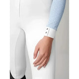 White riding pants paired with lemieux olivia long sleeve show shirt mist featuring laser cut lace sleeves and silver buttons