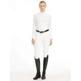White high waist riding pants with a sleek fit paired with lemieux olivia long sleeve laser-cut lace shirt