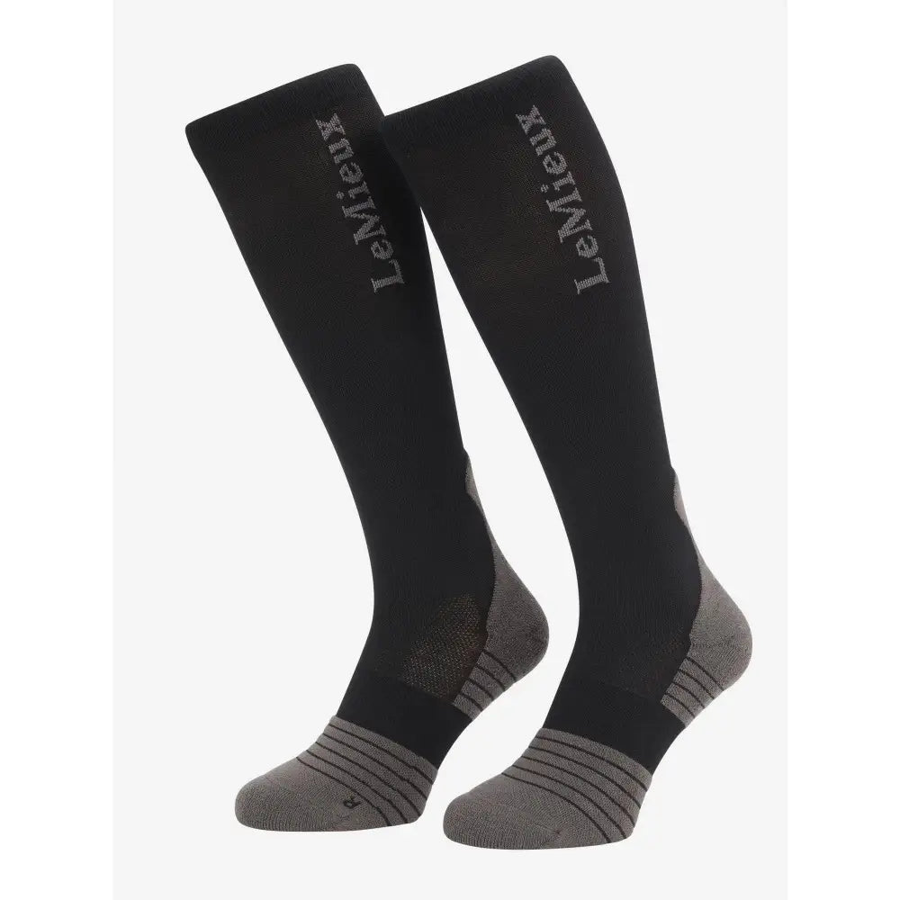 Black lemieux performance sock with gray padded heel toe and side panels for all day comfort and support